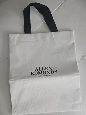 Allen Edmonds White Shoppinh Bag with Black Handles and Logo